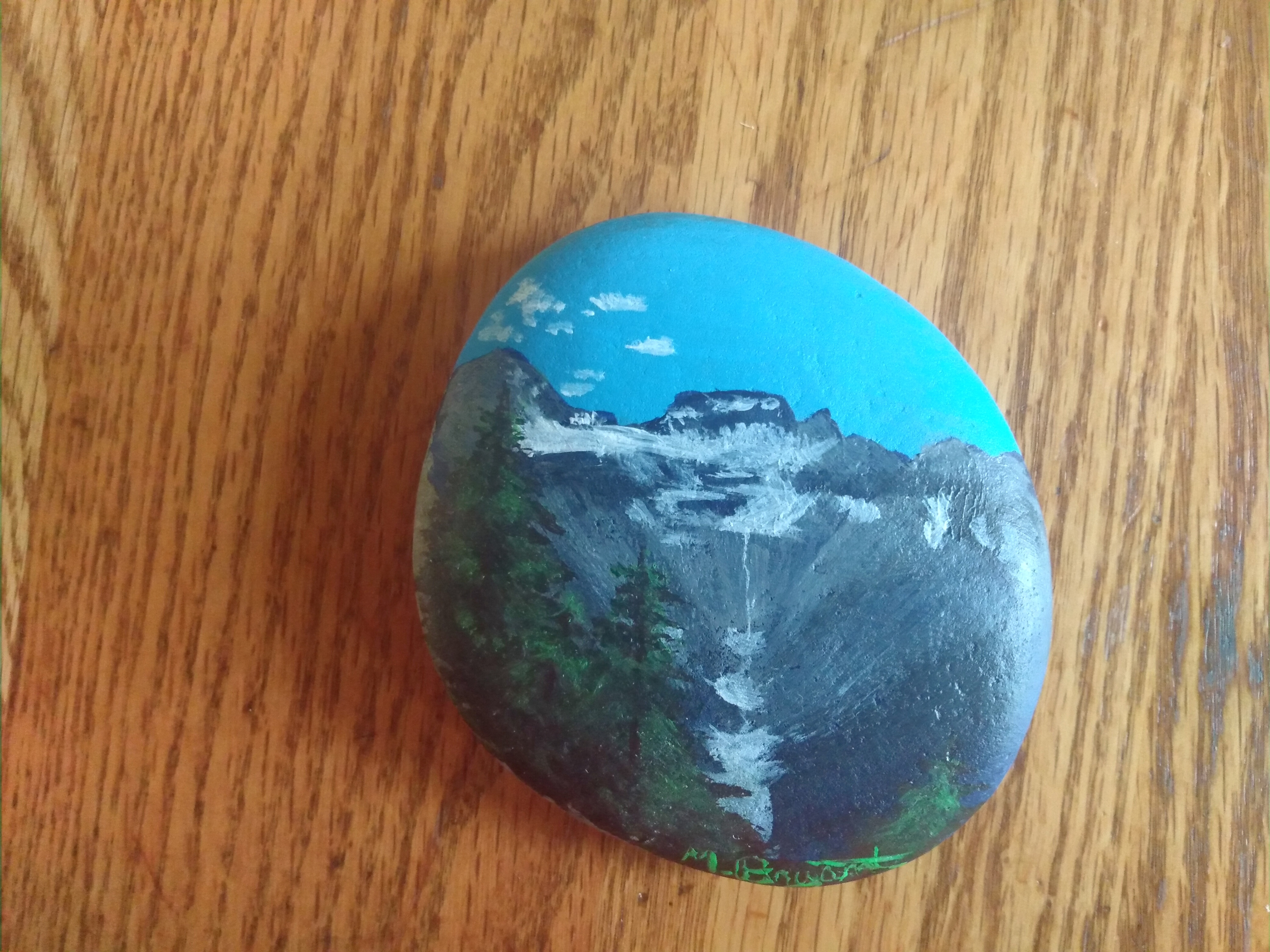 Mountainscape painted on a rock